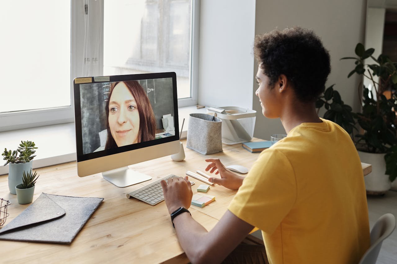 Boy in Yellow T-shirt Using Imac
